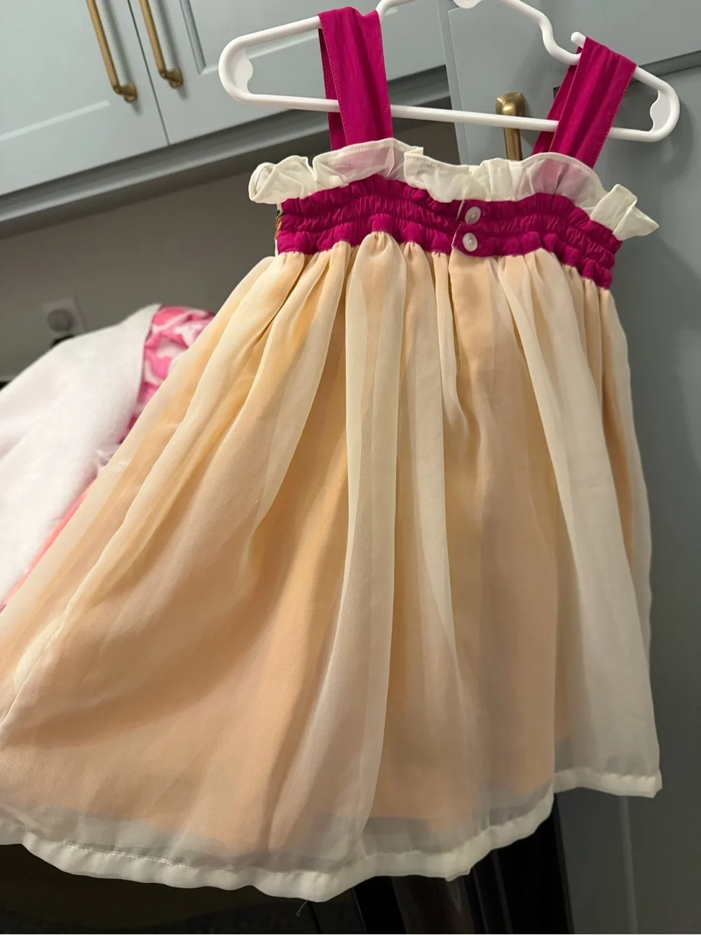 Well Dressed Wolf Cream Chiffon Dress with Pink Straps and Teal & Orange Ribbons